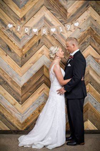 Load image into Gallery viewer, Shown face is  6" Beveled edge v groove side, With 3 medium browns 1 dark brown and 2 grays for that perfect Weathered Wood look. Reversible your choice during install.