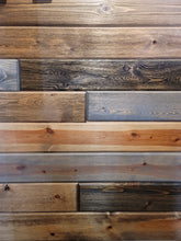 Load image into Gallery viewer, Shown face is  6&quot; Beveled edge v groove side, With 3 medium browns 1 dark brown and 2 grays for that perfect Weathered Wood look. Reversible your choice during install.
